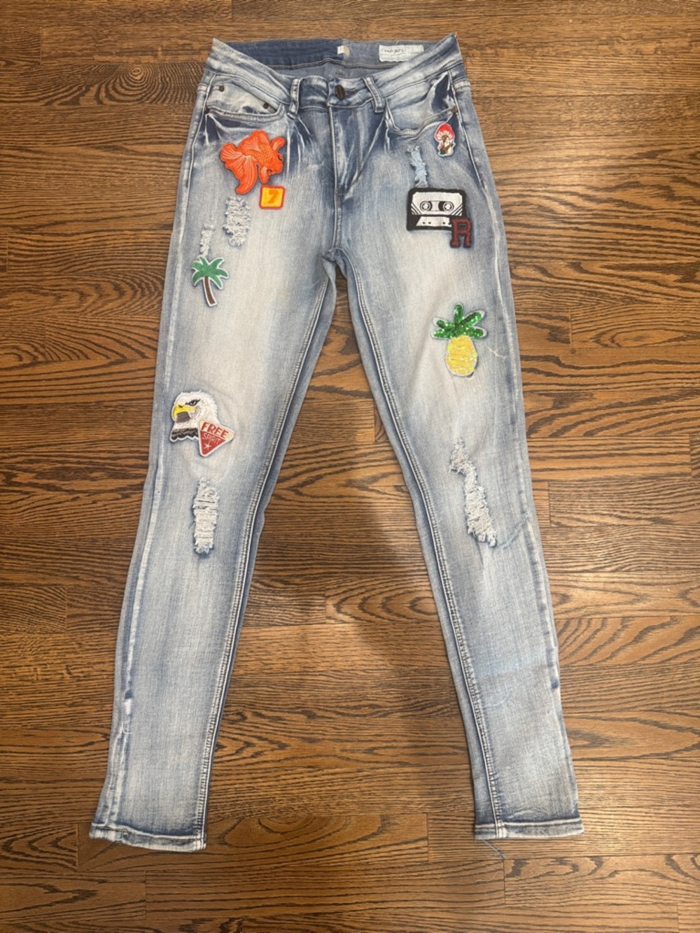 Light Blue Skinny Jeans with Colorful Patch Accents